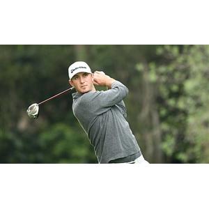 Johnson comfortable with wet conditions for title defence