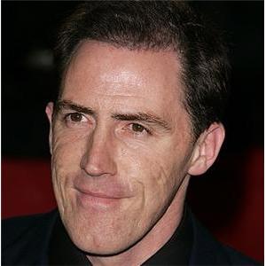 Brydon enjoys perfecting golf skills with his son at the range