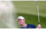 Michael Hoey holds off late charge from Rory McIlroy