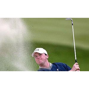 Michael Hoey holds off late charge from Rory McIlroy