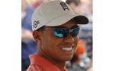 Woods Bends Over in Pain, Left Six Strokes Behind the Leader