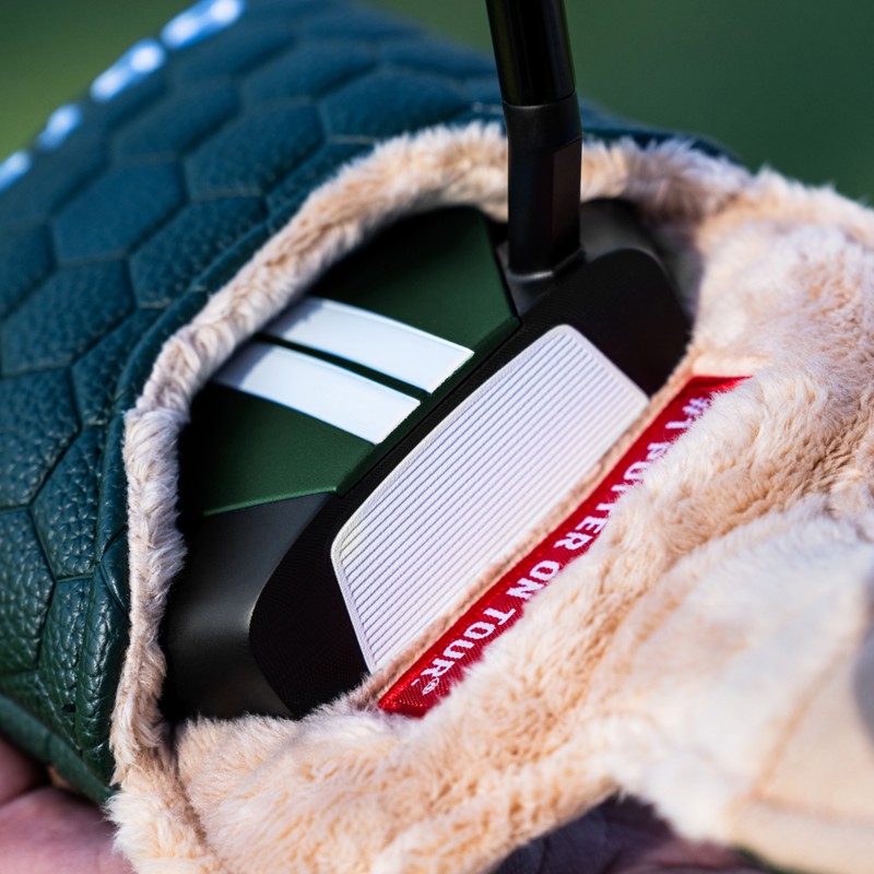 TRTL putter tucked into its fleece-lined headcover